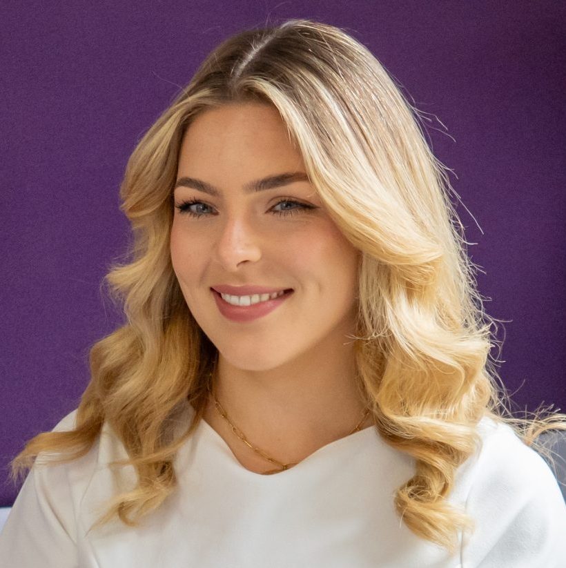 Ellen Murtimer in the Inntel office sitting in a chair smiling