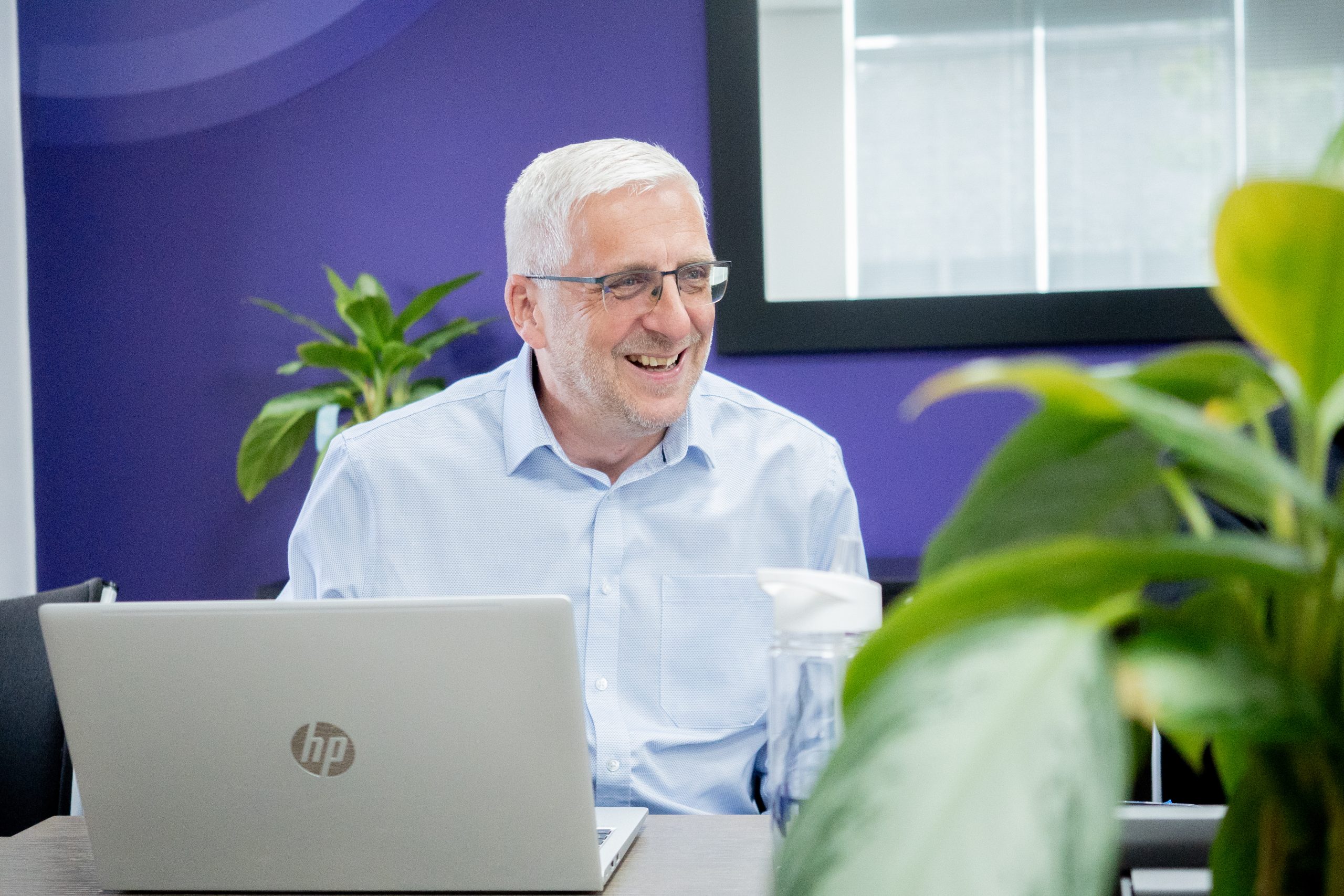 Stuart Tandy sitting in a meeting room at Inntel House