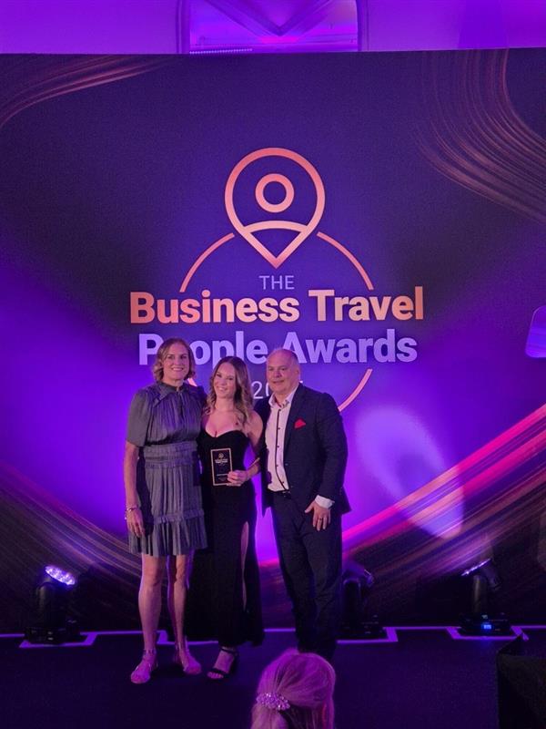 Megan Long receiving an award on stage at The Business Travel People Awards 2026